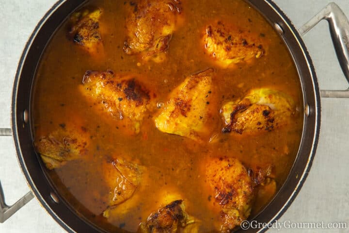add browned chicken to the pot.