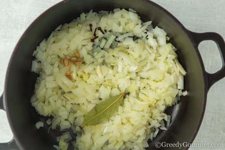 cooking onion with spices.
