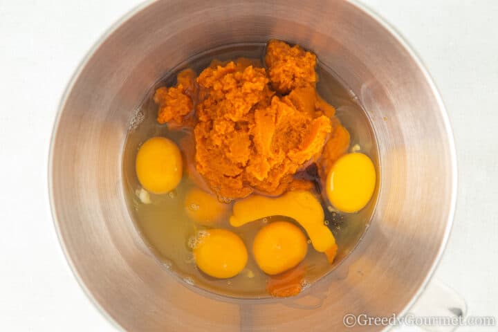 Pumpkin and eggs in a bowl.