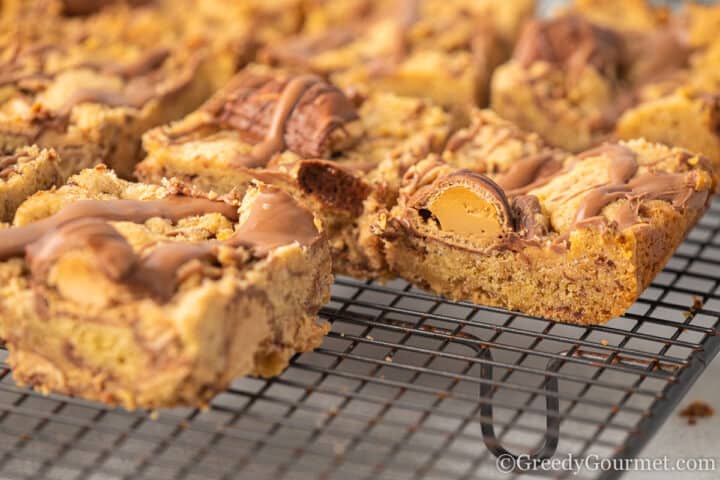 kinder Bueno cookie bars on cooling rack.