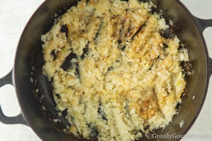 caramelised onions in frying pan.