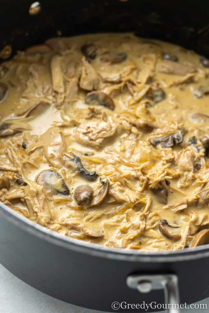 leftover turkey stroganoff cooked in a pan.