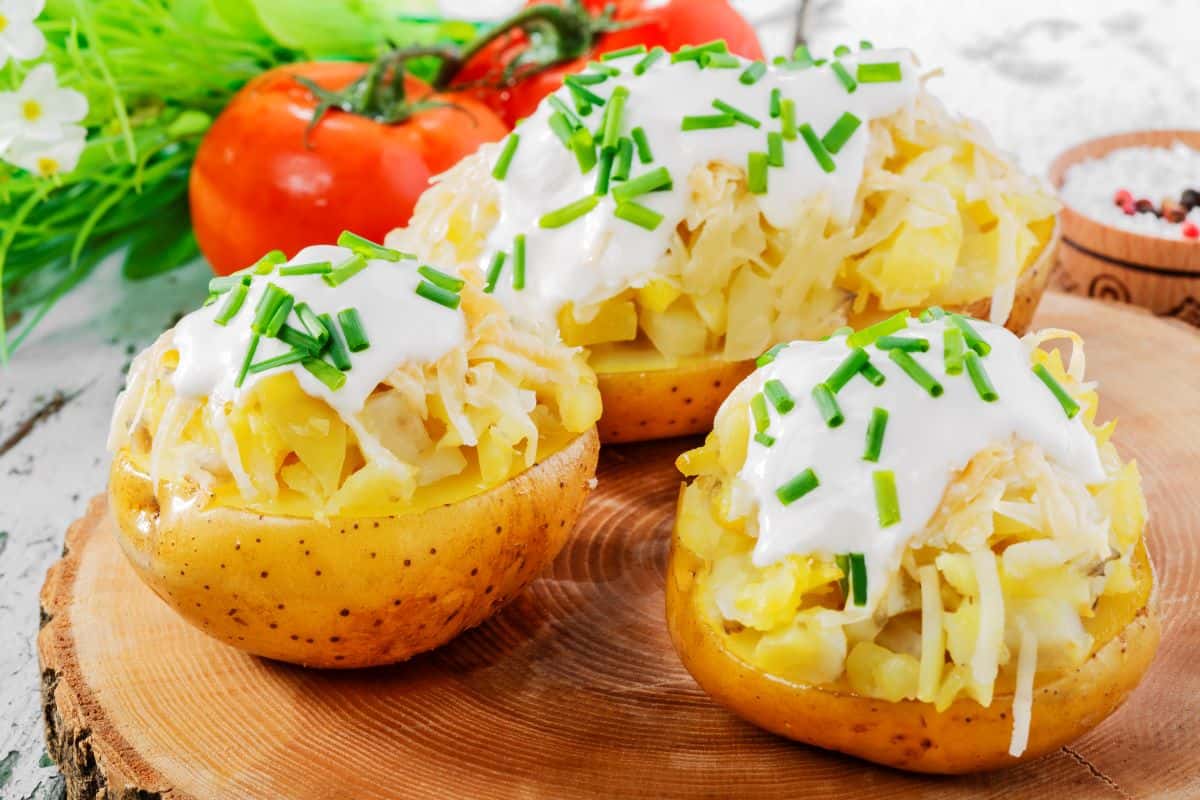 baked potato with cheese and sauce.