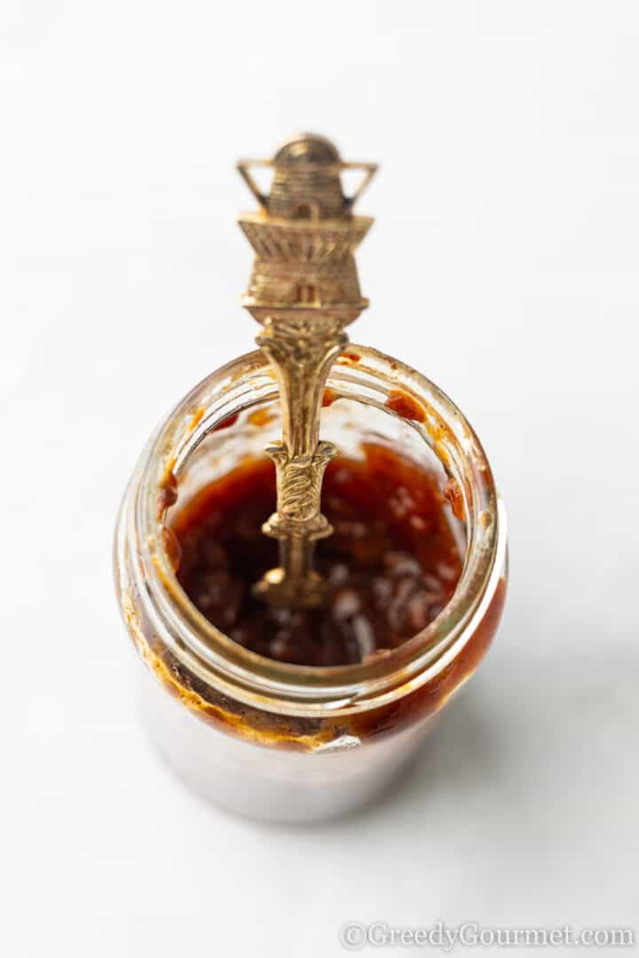 raspberry chutney in a glass jar.