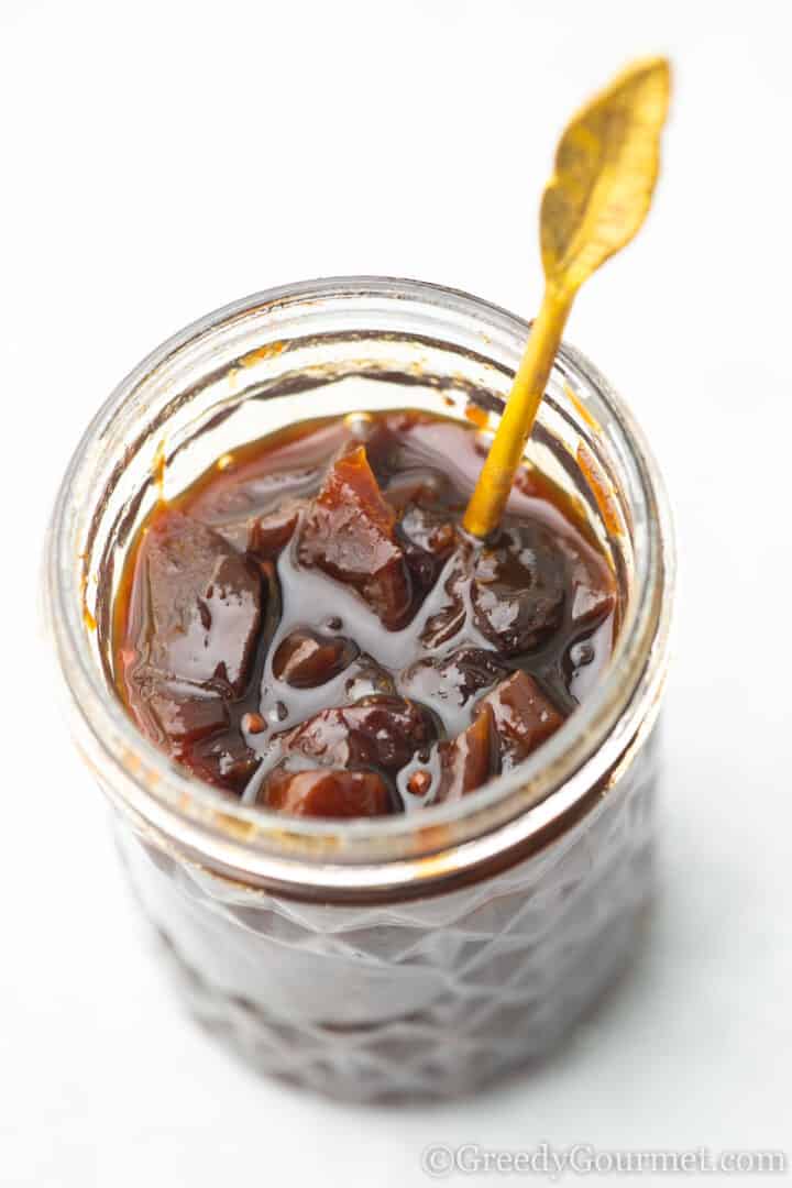 inside a jar of peach chutney.