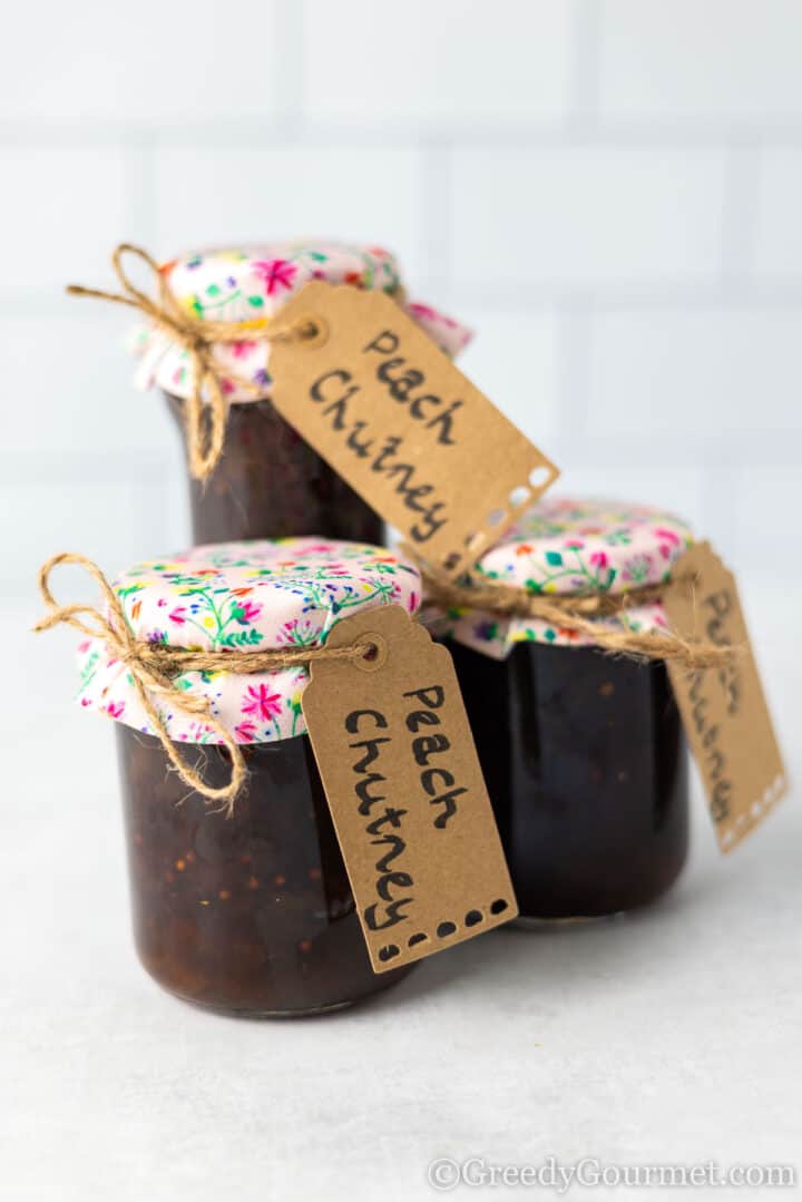 labelled peach chutney jars.