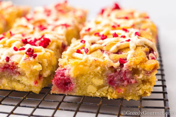 blondie squares on a cooling rack.