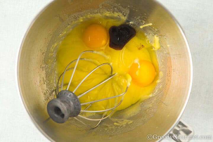 butter, sugar, eggs and vanilla in a mixing bowl.