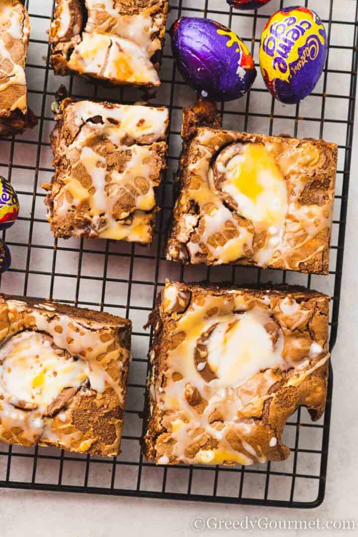 brownie squares on a cooling rack.