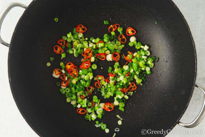fried spring onions and chillies.