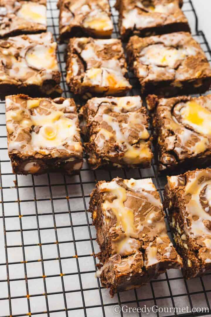 brownie squares on a cooling rack.