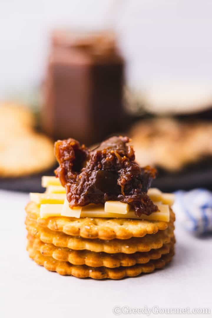 fig chutney and cheese on a cracker.