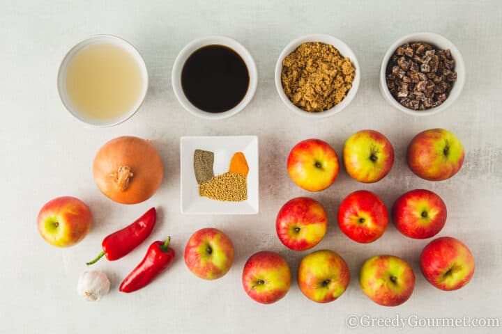 ingredients for apple chutney on a table.