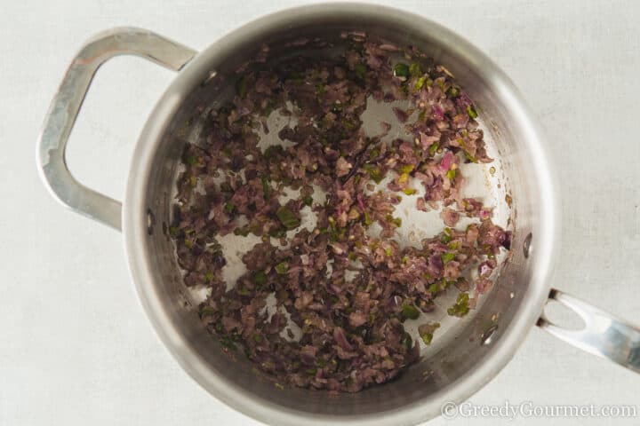 frying onion and chilli.