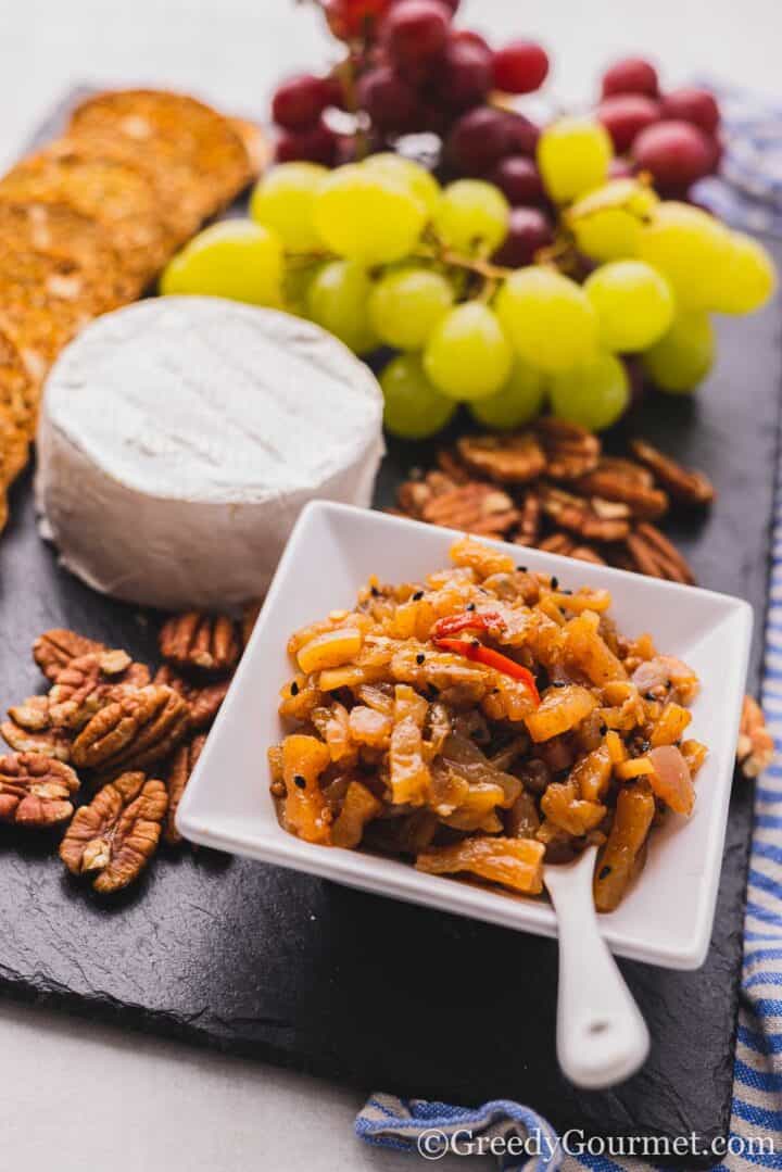 pineapple chutney on a cheese board.