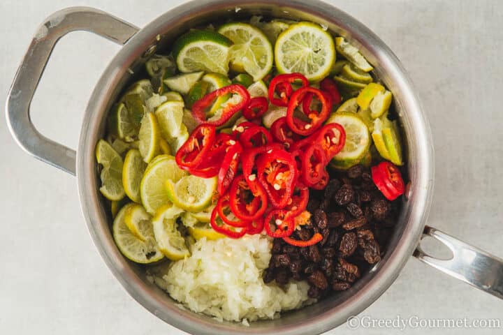 raw chopped ingredients in a pot.