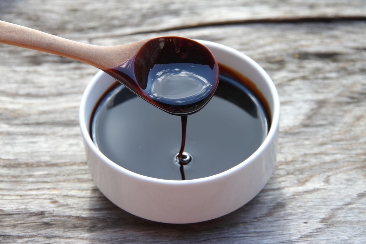 Blackstrap molasses in a pot.