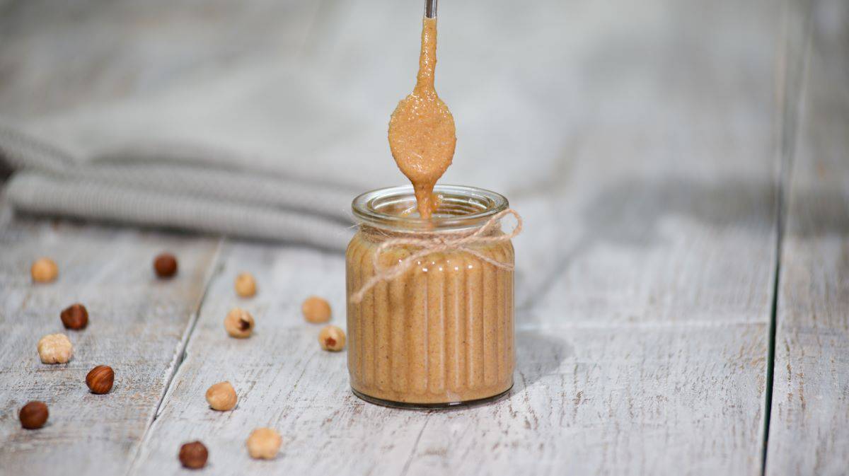 Hazelnut butter in a small jar.