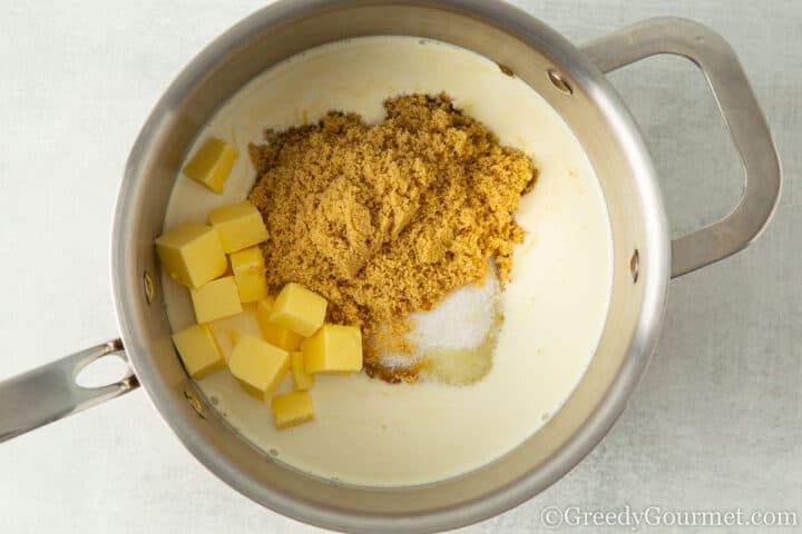 Butter, sugar and cream in a pot.