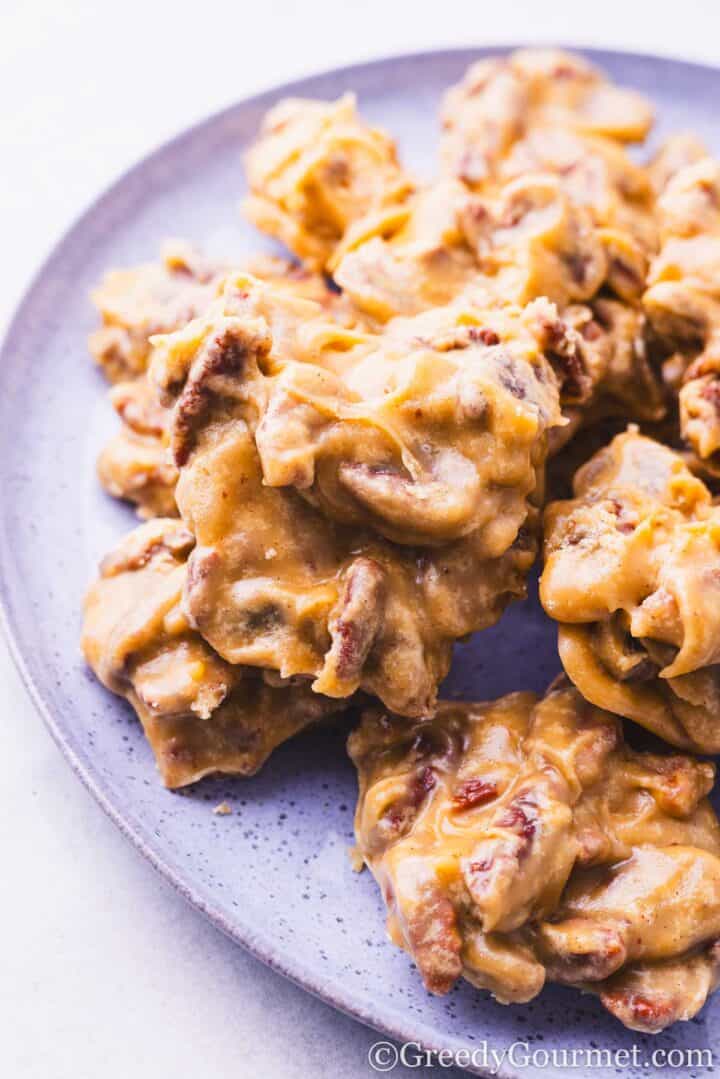 Pecan pralines on a plate.