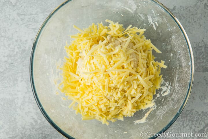 Cobbler dough and grated cheese.