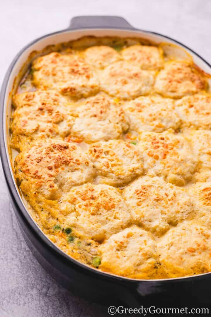 Chicken cobbler in a baking dish.