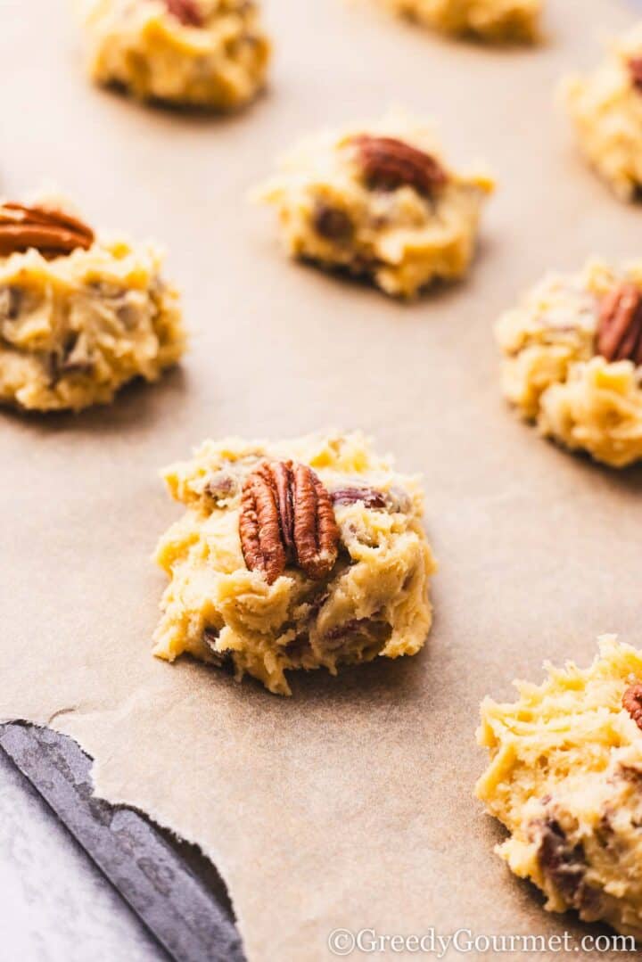 raw pecan dough blobs ready to go into the oven.