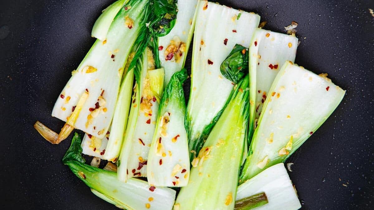 Plate of a vegan stir fry of bok choy.