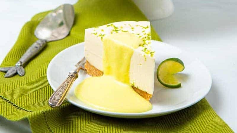 White cheesecake with lime curd drizzle