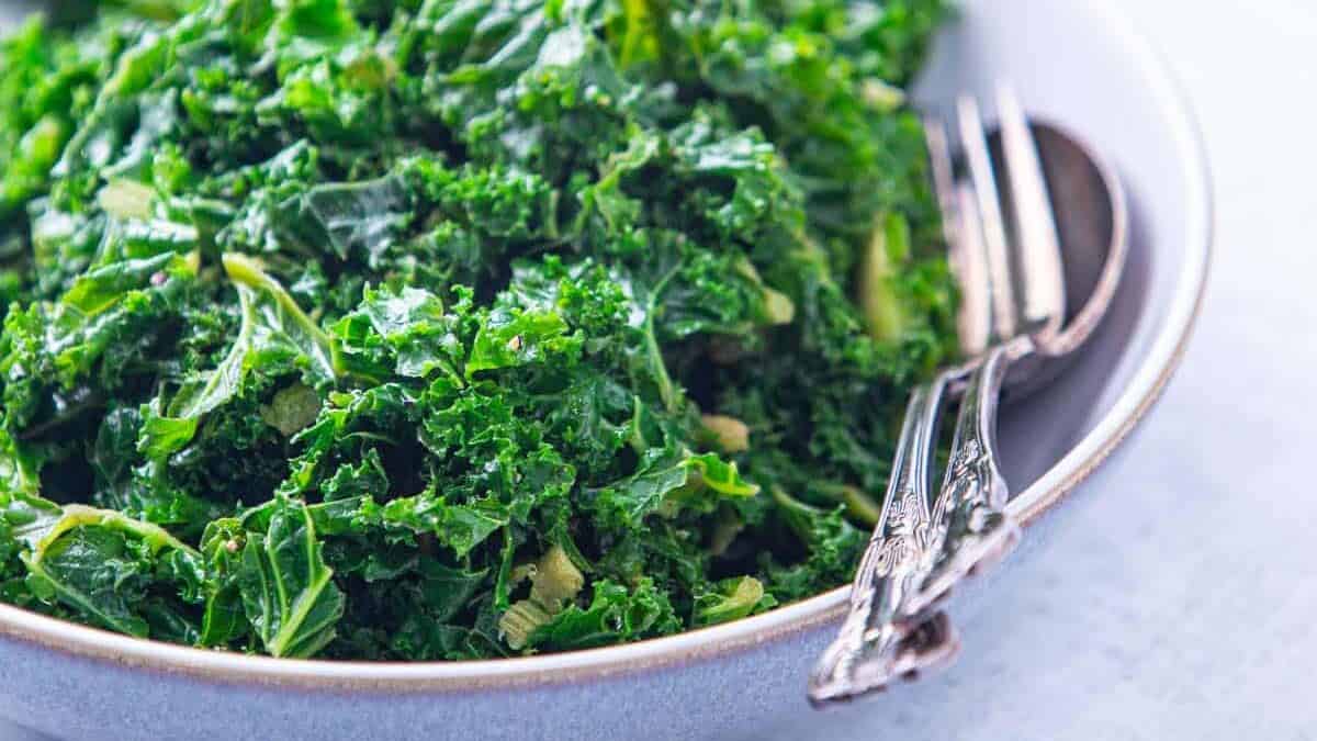 Bowl of bright green blanched kale