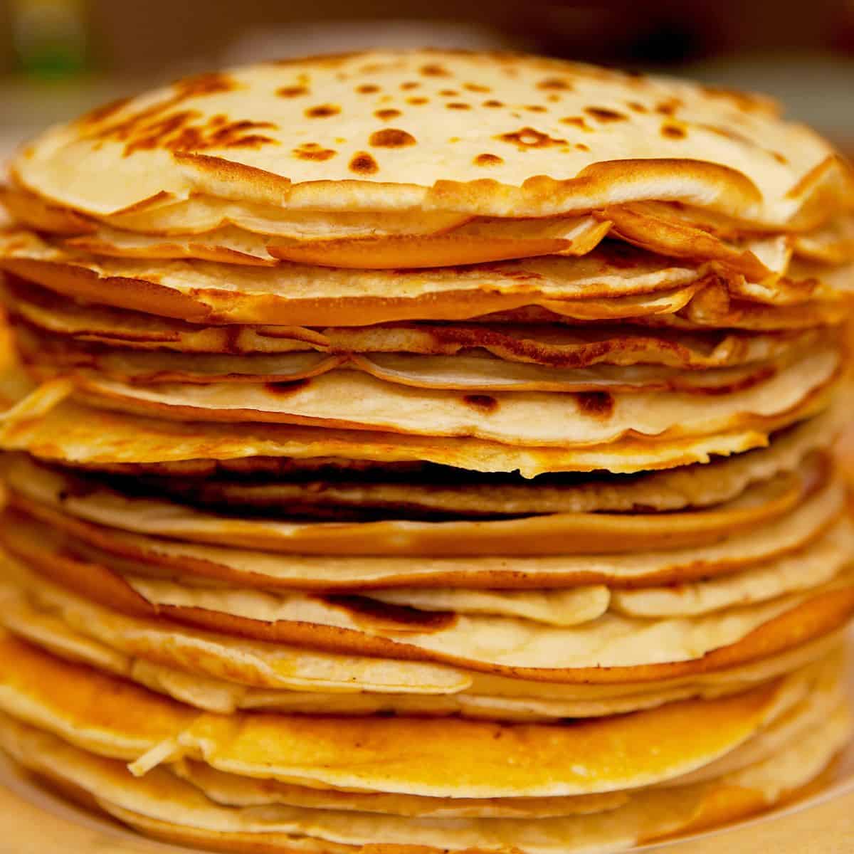Stack of crepes for how to reheat pancakes.