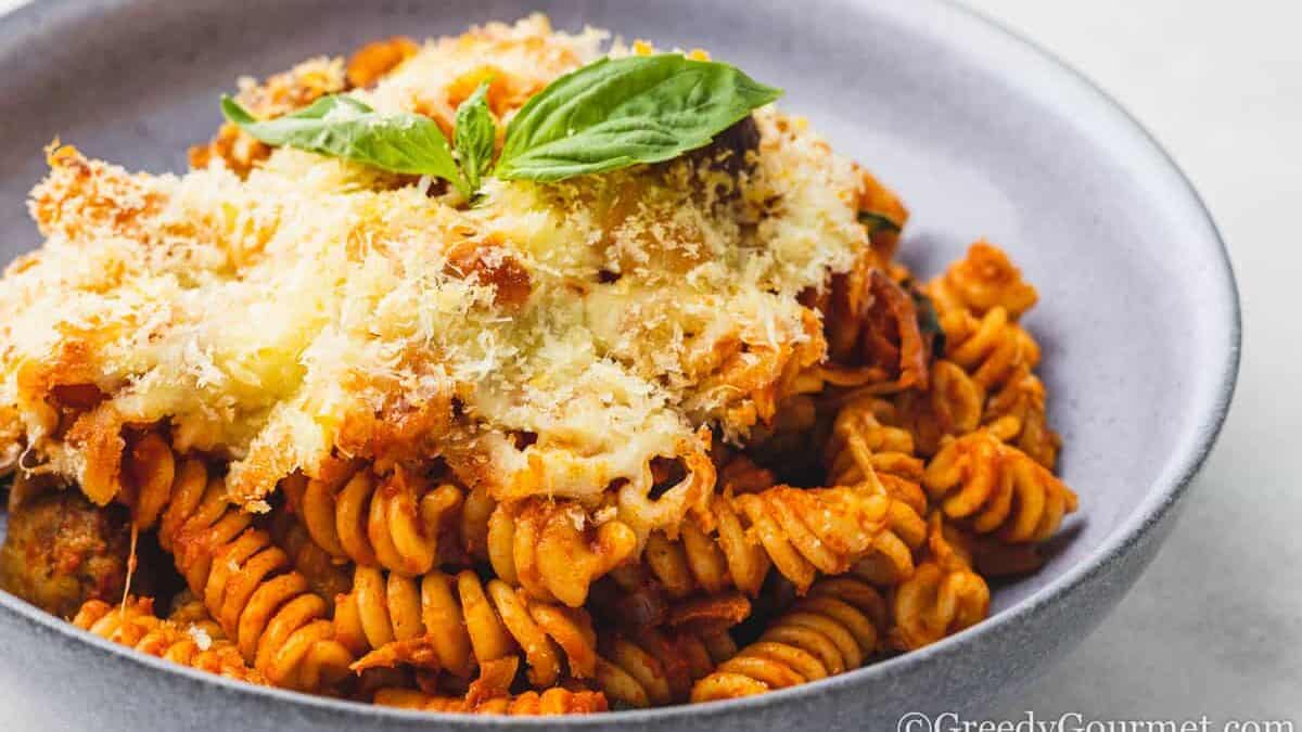 sausage pasta bake in a bowl.