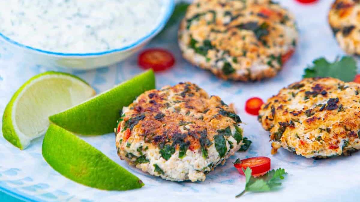 Plate of thai shrimp cakes with a creamy dip