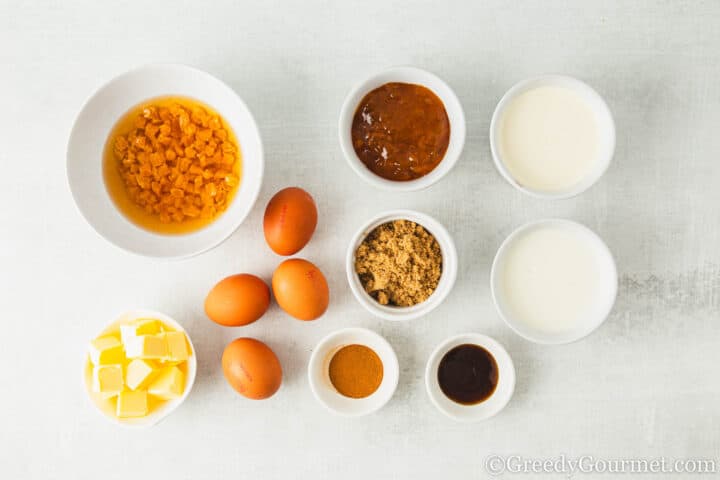 Ingredients for Bread and Butter Pudding on a table.