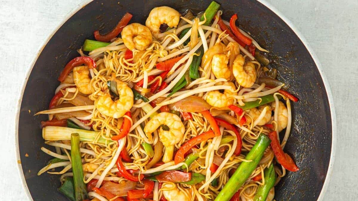 Cooked king prawn chow mein.