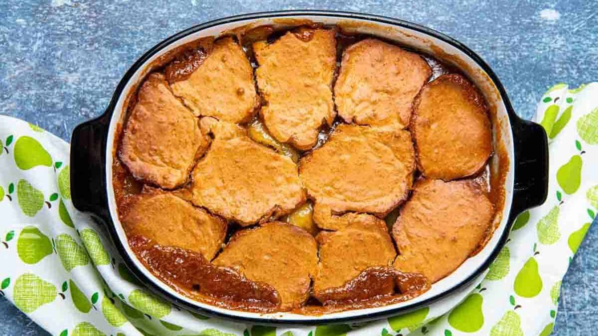 Aerial view of pear cobbler in a casserole dish