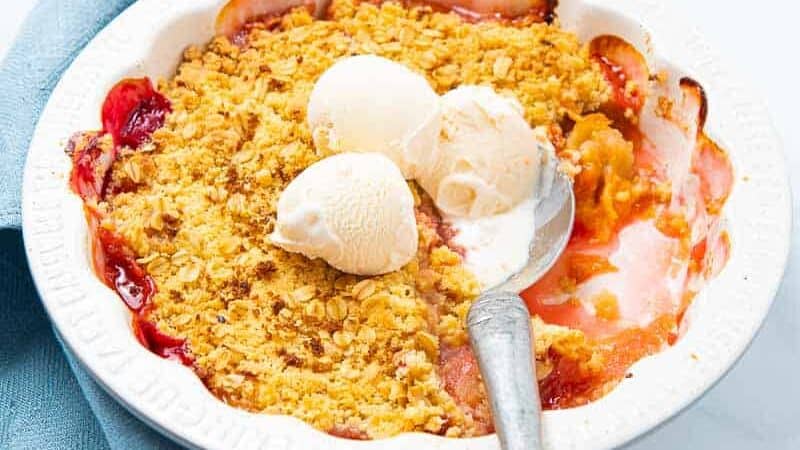 Crumble served with ice cream.