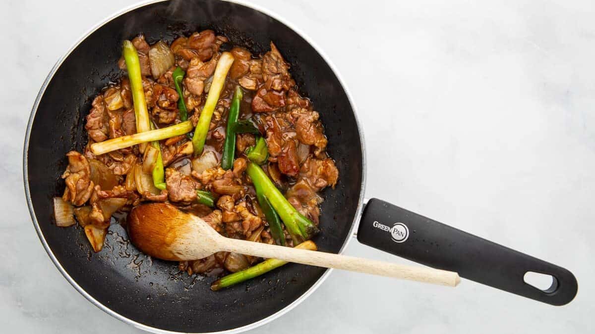 A Chinese lamb recipe being made in a wok