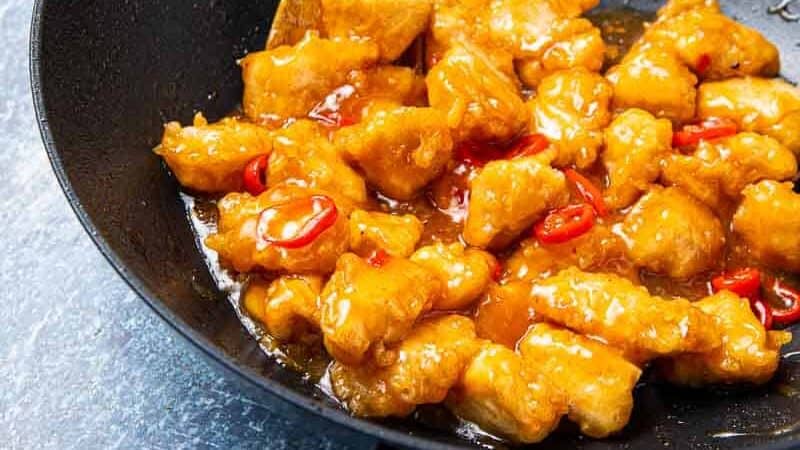 Honey Chilli Chicken cooking in a wok