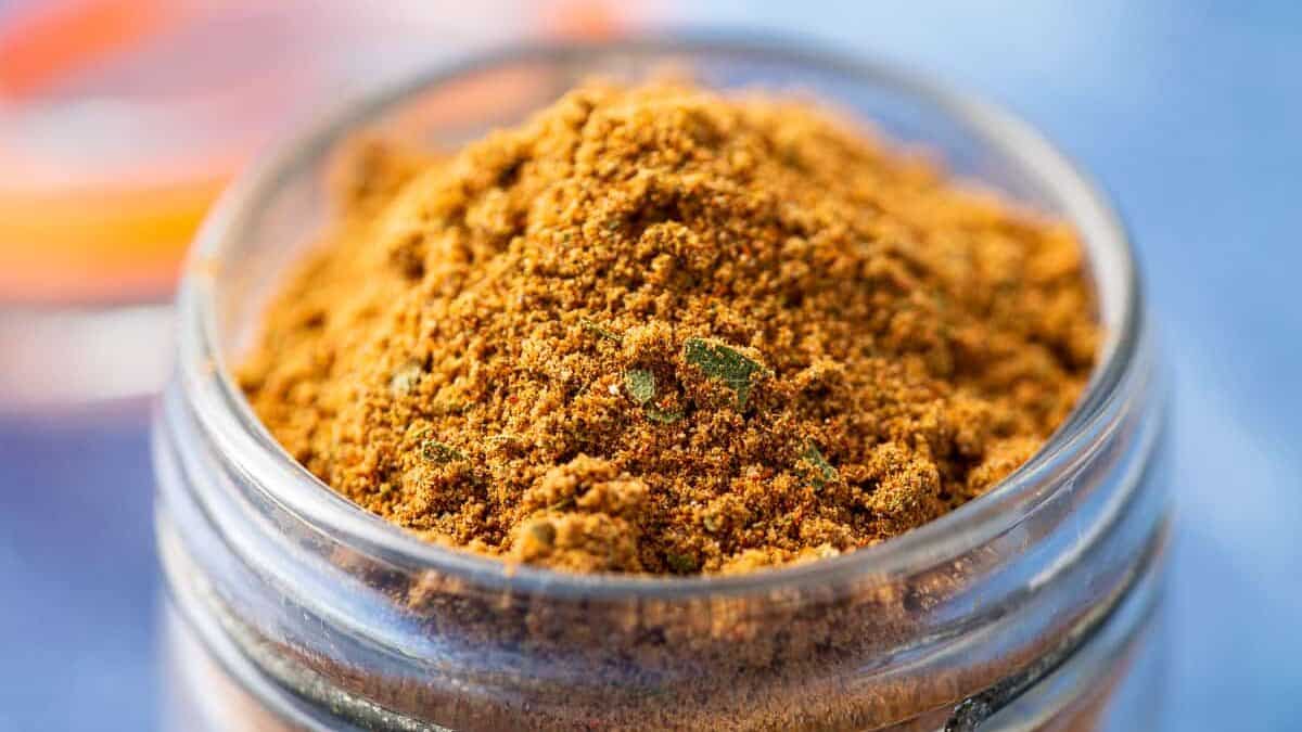 Close up of bay seasoning in a jar.