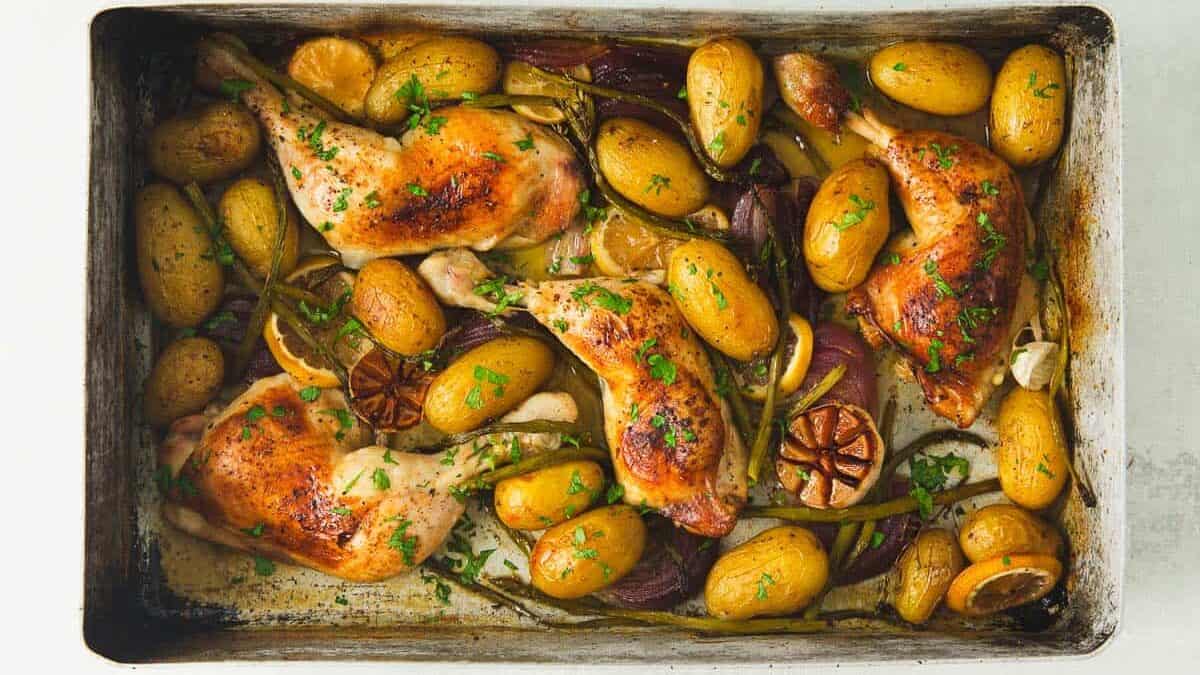 cooked lemon garlic chicken tray bake.