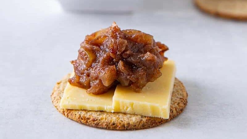 Marrow chutney on top of a cracker