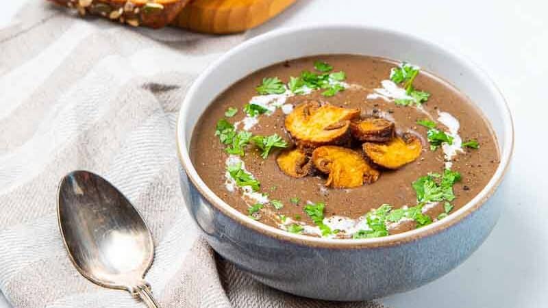Bowl of soup and loaf of bread