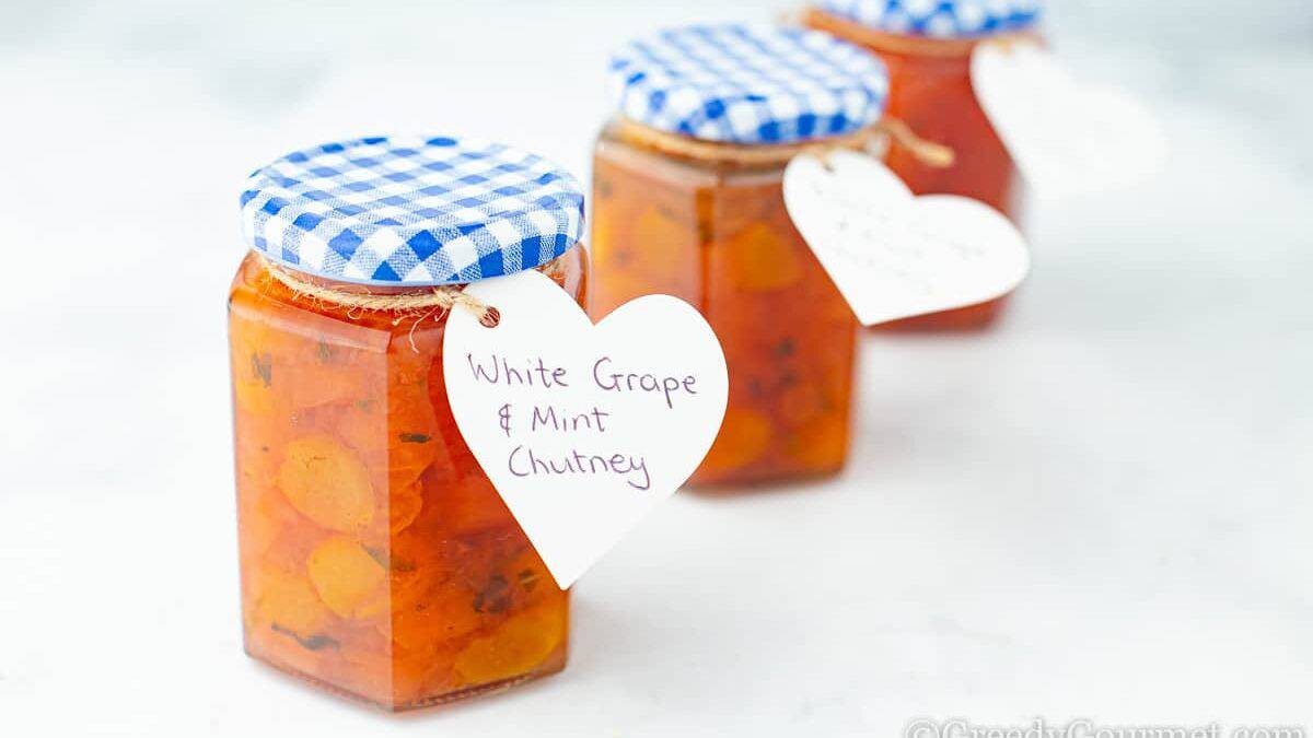 Three jars of a white grape chutney recipe