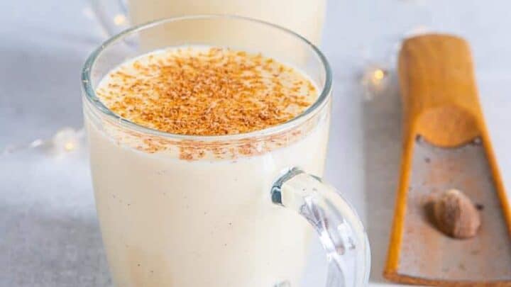 Two glass mugs of boiled custard with nutmeg