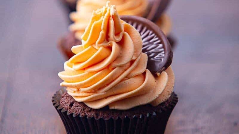 Chocolate cupcake with orange frosting