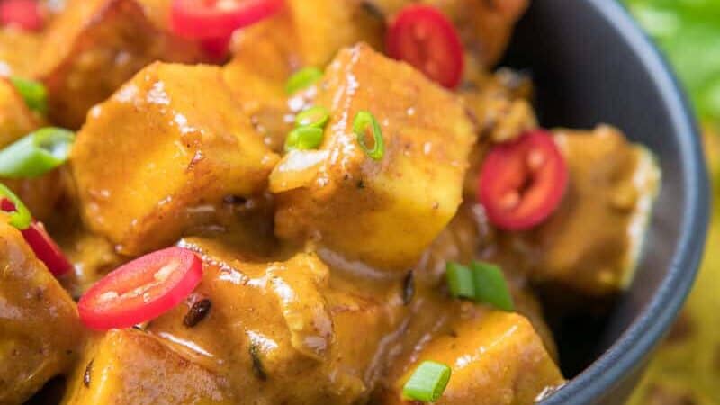 A bowl of Malai Panner up close