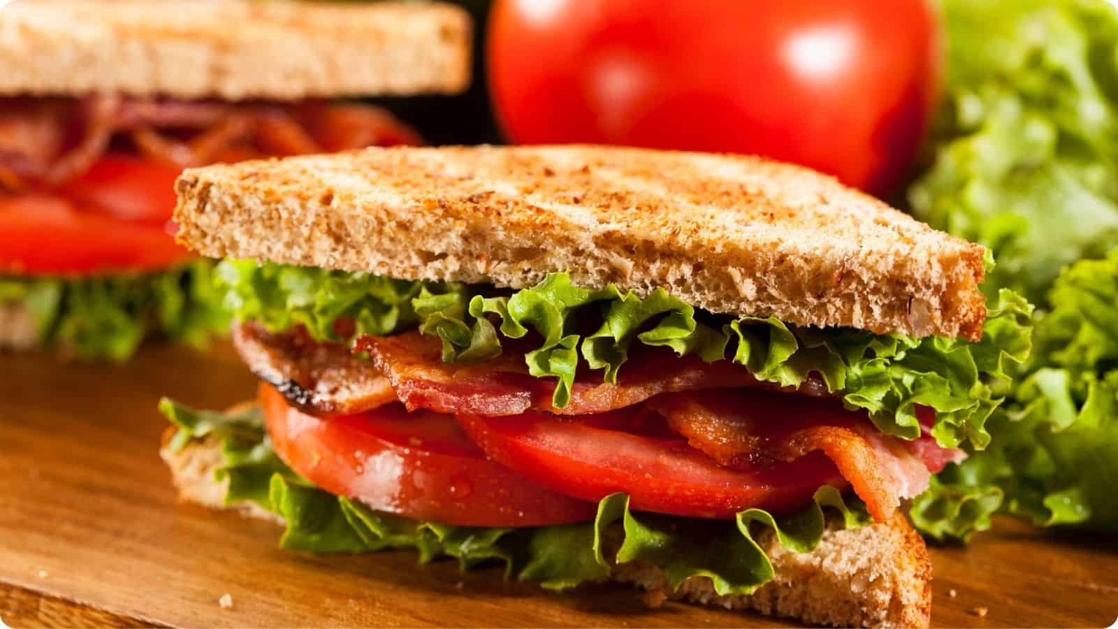 BLT Bacon Lettuce and Tomatoes in a toasted loaf bread.
