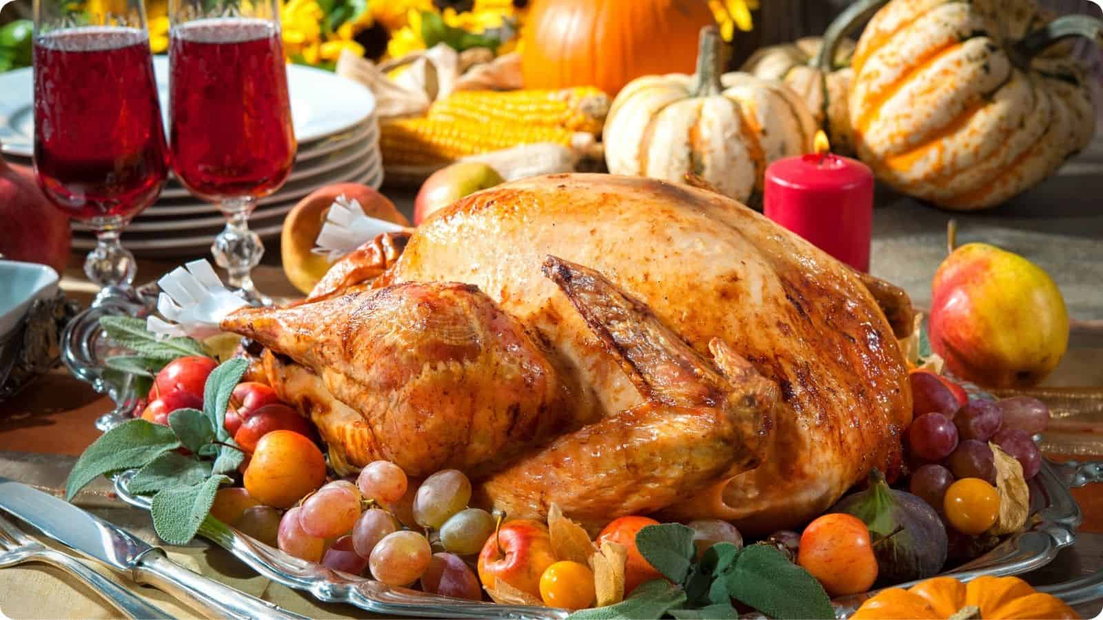 Thanksgiving Turkey served as the centerpiece embellished with fruits.