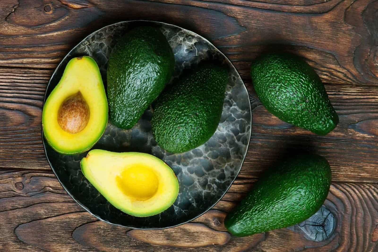 avocado halves in a bowl.